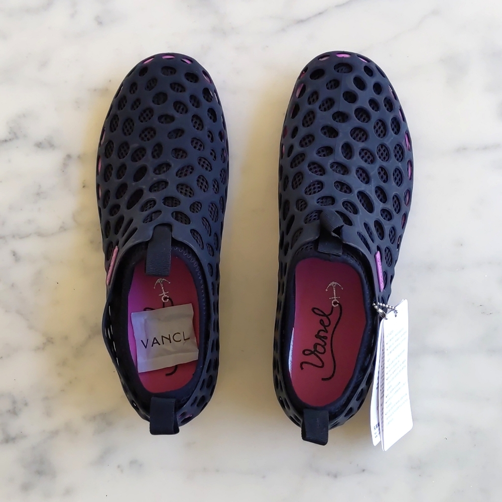 NWT. Multi Color Water shoes with removable inside.